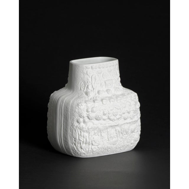 A white bisque porcelain AZU vase designed by Martin Freyer for Rosenthal Studio-Line in the 1970s. Its low, rounded form...