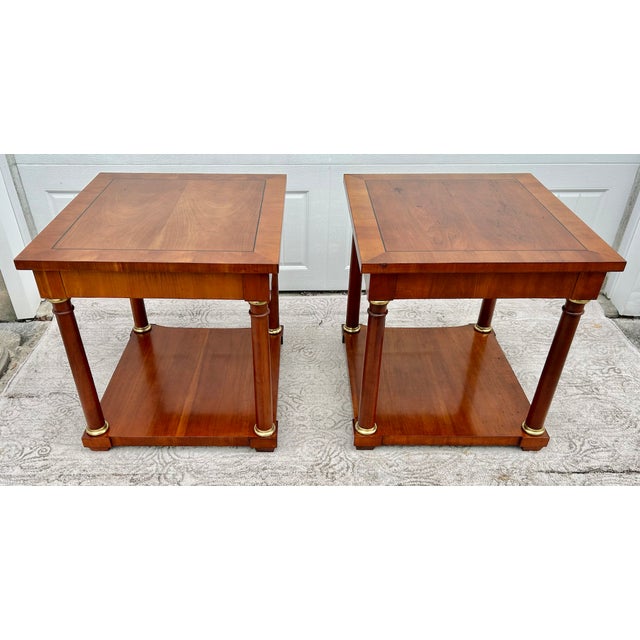 Vintage (1970's) Pair of Side/End Tables have a Regency Style. The Maker is Baker Furniture. Made of Wood. CherryWood. The...
