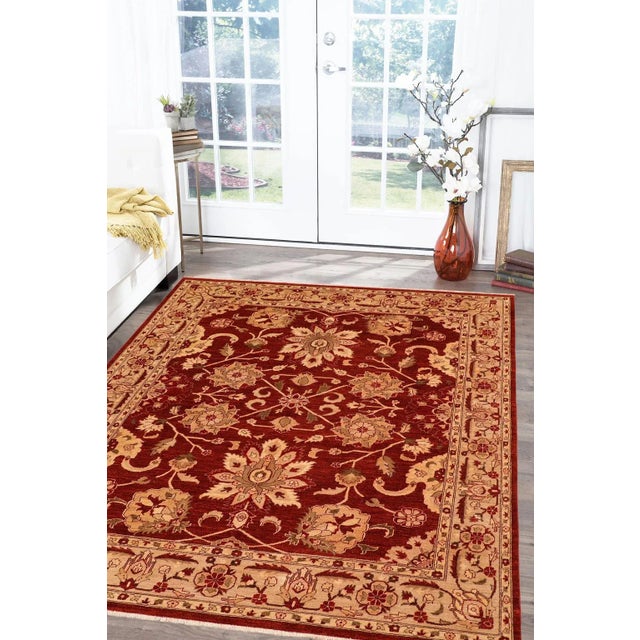 "Enhance the ambiance of your home with this magnificent Persian-influenced Turkish hand-knotted rug made by skilled...
