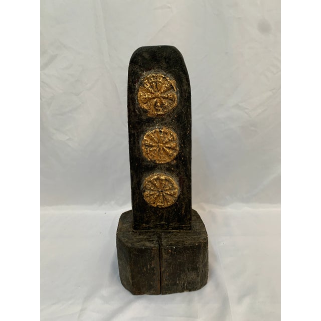Carved wood fragment. An early piece of detailed carving. one continual piece of wood primarily black with a raised gold...