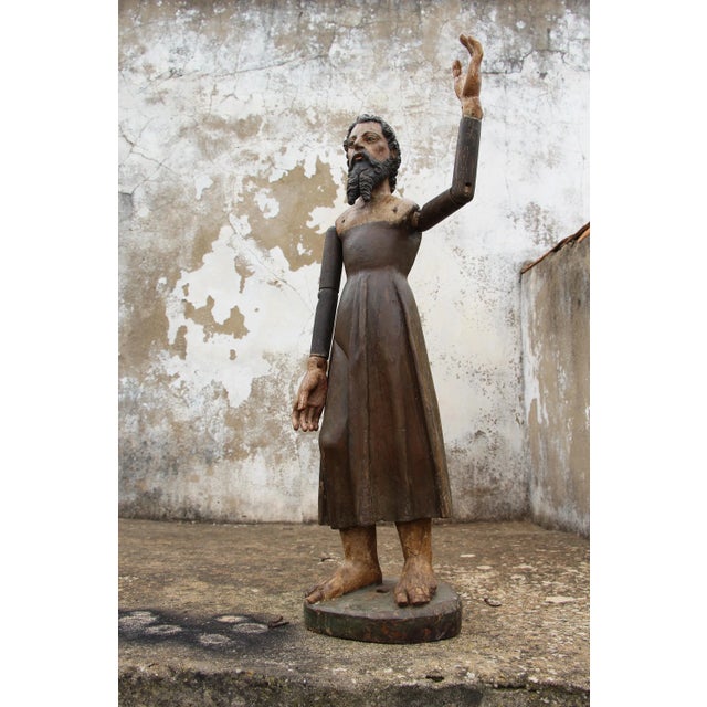 Origin: Portugal. Material: Wood. Circa: 18th Century. Item Condition: Some cracks and flaws can be noted along the...