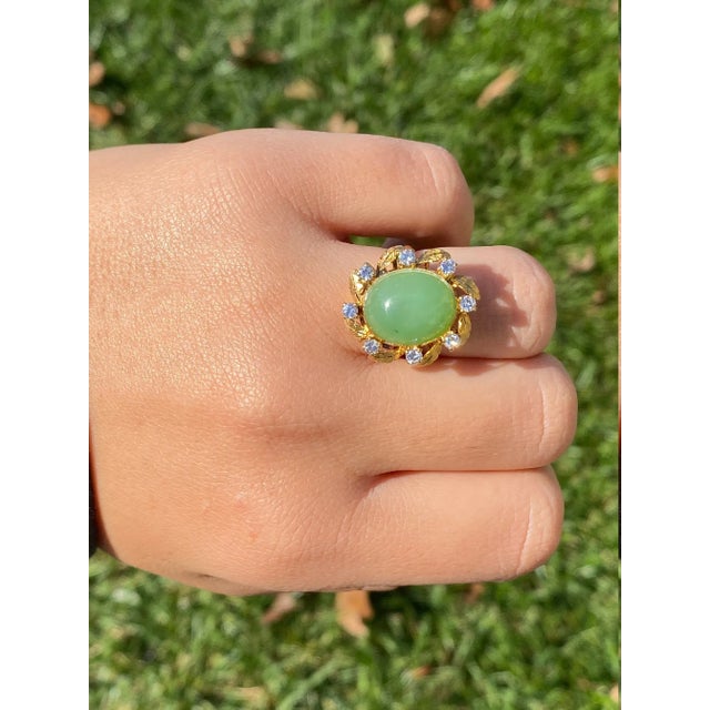 The Molanary Ladies Vintage Serpentine and Diamond Cocktail Ring in Yellow Gold. This remarkable cocktail ring features...