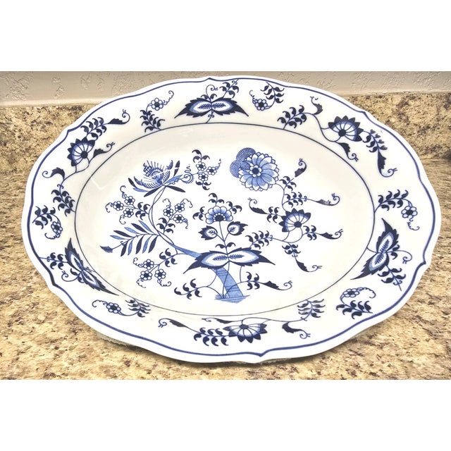 Elegant and timeless, this beautiful vintage oval serving platter in the iconic Blue Danube pattern brings classic blue-...