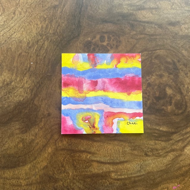 Bright, expressive, and full of energy, this small abstract watercolor painting features bold horizontal bands of vivid...