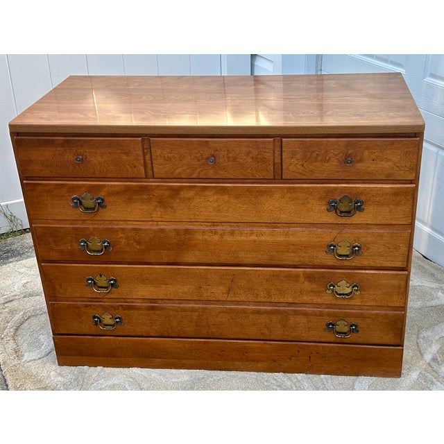 Vintage (1960's) Chest of Drawers has an Americana Style. Made by Ethan Allen. The Wood is Maple with Mica Tops. The Chest...