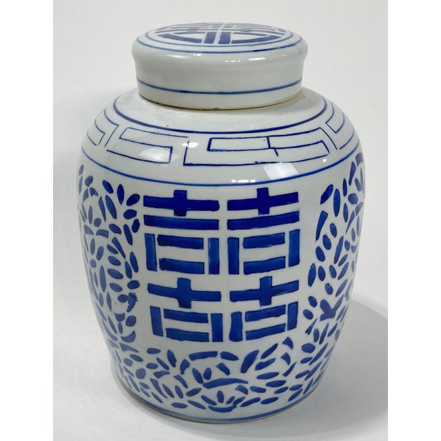 Vintage Chinese hand-painted ceramic double happiness ginger jar in blue and white with lid. Age wear. Minor chips inside...