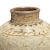 Handcrafted Cizhou wares are decorated characteristically with iron-pigmented brown slip atop a cream-colored background...