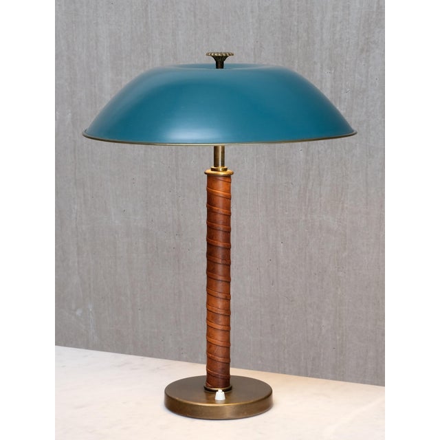 This extremely rare table/desk lamp was designed by Bertil Brisborg and produced by Nordiska Kompaniet in Sweden in the...