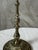 An elegant pair of brass candlesticks dating from the 1920s, with particularly refined decoration. Each candlestick...