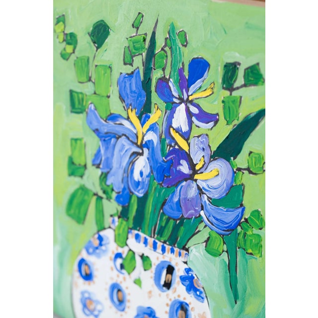 This small painting features a vibrant bouquet of irises in glorious deep purple, yellow, and blue with lovely abstracted...