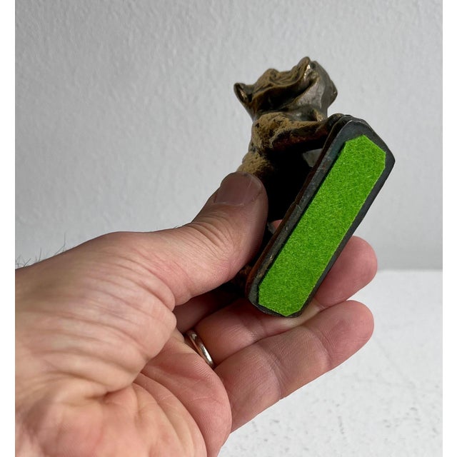 Small "French" Bulldog Statue "can also be used as a paperweight" " has a round stamp on the top of the base which says...