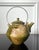 A contemporary studio ceramic tea pot with metal handle made by Japanese potter Ken Matsuzaki (1950-). The stoneware tea...