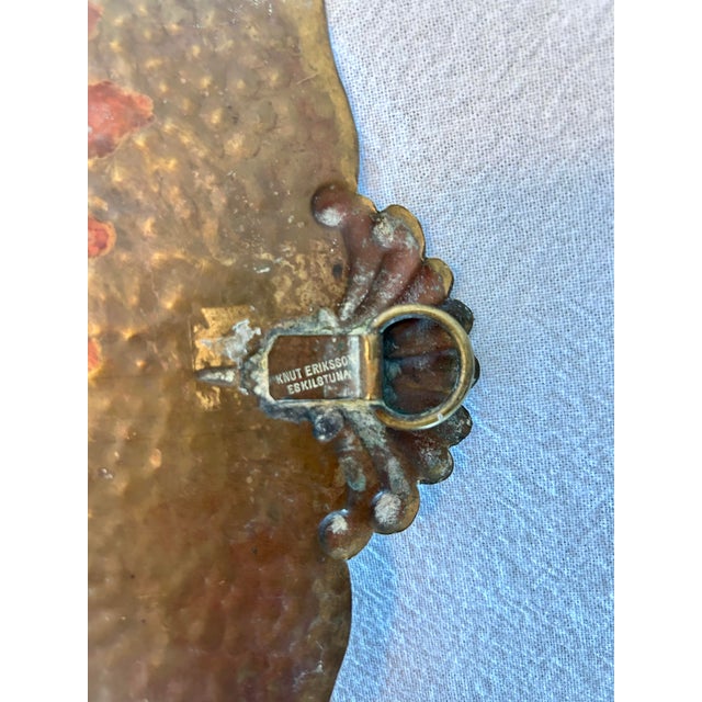 Swedish brass sconce from designer Knut Eriksson Eskilstuna. A beautiful addition to any wall adding warmth and charm.