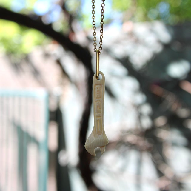 Gold 1990s Fossilized Mammoth Tusk Wrench Charm With 14k Gold Bail For Sale - Image 8 of 9