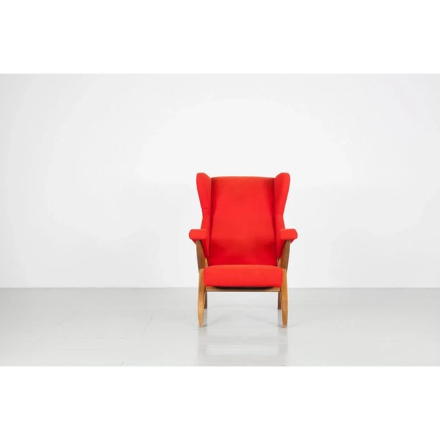 This Italian pair of armchairs "Fiorenza" was designed by Franco Albini for Arflex. The elegantly shaped wooden frame...