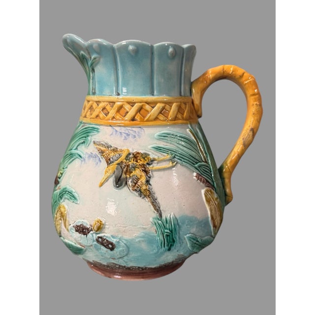 Majolica Antique Victorian Majolica 7.5" Pitcher With Heron Flying Over a Pond Setting For Sale - Image 4 of 12
