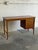 This teak vanity combines a broad work surface with a flip-up mirror, divided storage compartments, and three drawers. A...