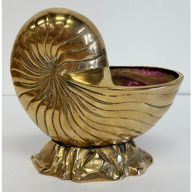 Vintage Hollywood Regency medium sized solid brass Nautilus shell planter or cachepot. Great patina with wonderful detail....