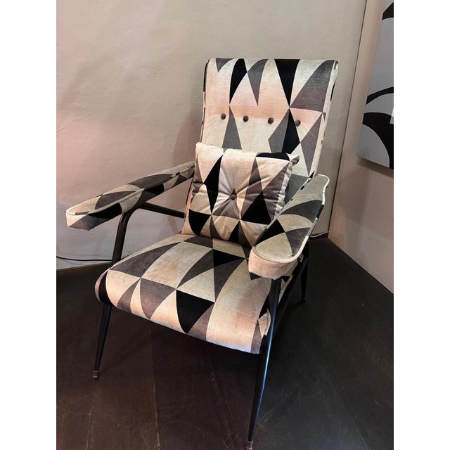 Armchair with reclining backrest covered with "Rubelli" velvet