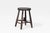 Antique French Provincial workshop stool, circa 1920s. Thick-cut round wooden seat supported by four splayed legs and an...