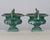 A pair of 19th century French small cast iron garden urn planters with pedestal base and scrolled handles. Weathered green...