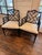Pair of upholstered and faux bamboo black painted Chinese Chippendale style armchairs, probably Baker, no labels or tags.