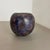 Article: Fat lava art vase Model: 502-2 Producer: Ruscha, Germany Decade: 1970s This original vintage vase was produced in...