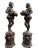 Stunning pair of large bronze statues in the form of a pair of elizabethan page boys. Each boy holds the urn from where...