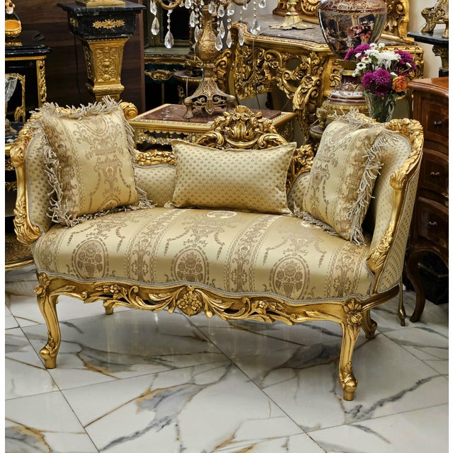 This vintage French style settee is a radiant statement piece designed to bring opulence, romance, and classic European...