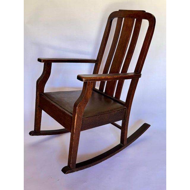 1900s Antique Mission Rocker With Leather Seat. Beautiful Craftsmen piece perfect for a Living or Bedroom.