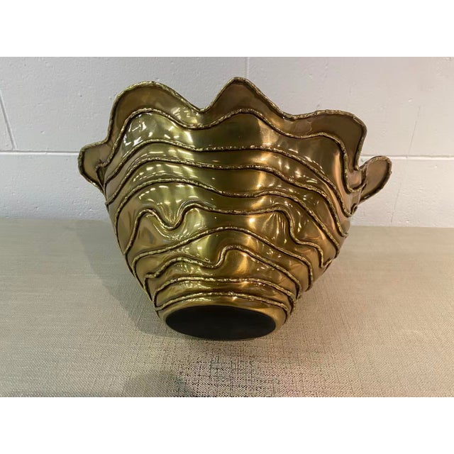 The Lagen Bowl is a decorative accent with a gorgeous dimensional look, contributing a wealth of depth to an interior...