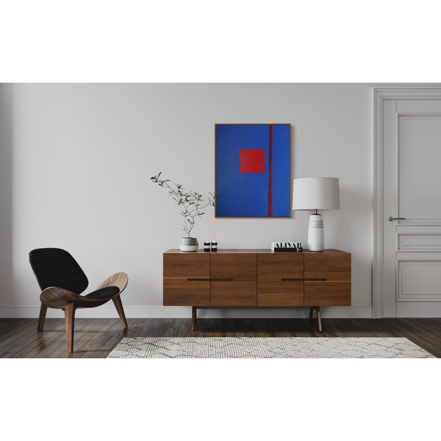 Minimalism meets intensity. This unique abstract painting in cobalt blue is defined by a single, powerful element: a...