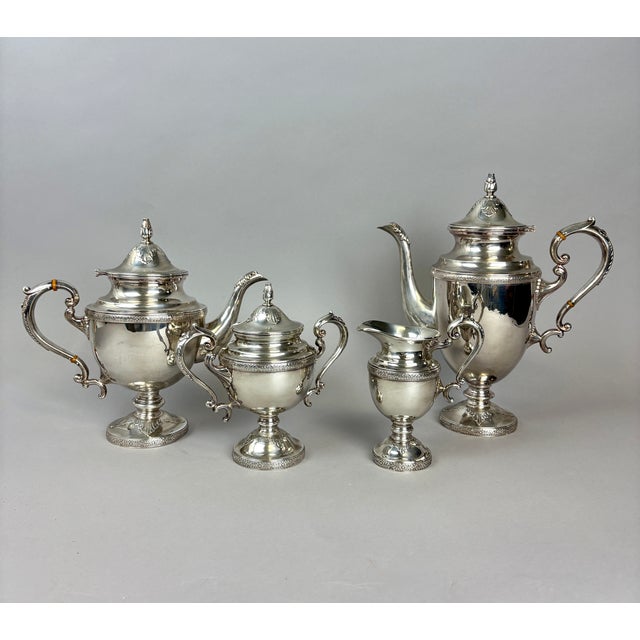 An exceptional and increasingly scarce Japanese .950 fine silver tea and coffee set by Toshikazu, offered complete with...