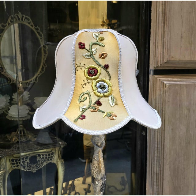 Add a refined European accent to your interior with this French-style gilded floor lamp, featuring an intricately sculpted...