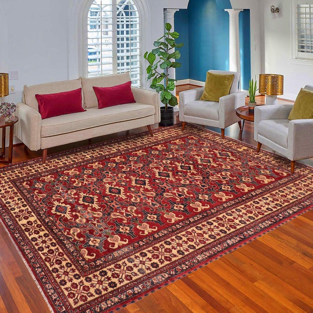 Enhance your home with this exquisite hand-knotted Super Kazak rug, crafted from fine hand-spun wool and dyed with all-...