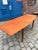 This restored extendable table, crafted from warm teak and solid oak, impresses with its masterful lines and striking...