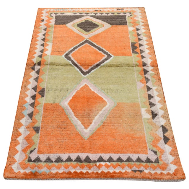 Hand-knotted with care using traditional rug making techniques, this wool rug blends timeless craftsmanship with a modern...
