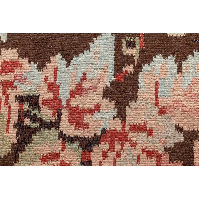 An exquisite example of early 20th-century Eastern European textile artistry, this handwoven Bessarabian kilim from the...