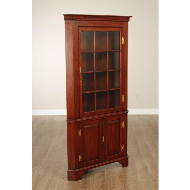 High Quality American Made Cherry Corner Display Cabinet with Locking Twelve-Pane Glass Door Opening to Lighted Interior,...