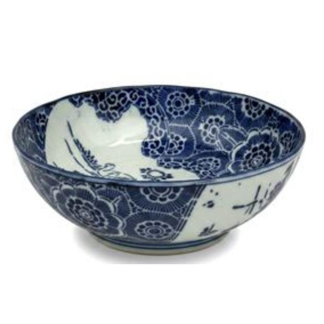 An exceptional matched set of four late 19th-century Japanese Imari porcelain bowls, distinguished by their sophisticated...