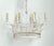Illuminate your home with the whimsical charm and airy elegance of this vintage wire basket chandelier. Evoking the...