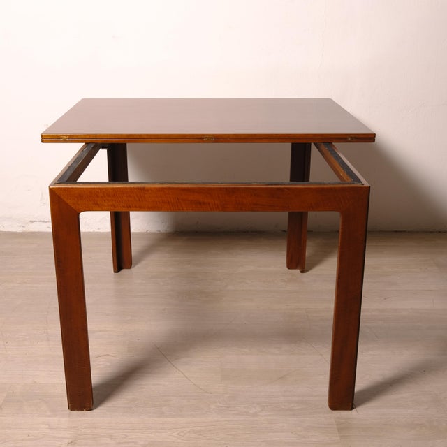 Beautiful and comfortable wooden table, folding, simple, clean design, and elegant lines. 1950s-1960s. Dimensions: Closed...