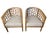 Add a striking architectural element to your seating arrangement with this handsome pair of barrel-back tub chairs....