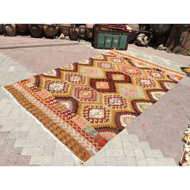 This beautiful, vintage, handwoven kilim is approximately 60 years old. It is handmade, of very fine quality hand spun...
