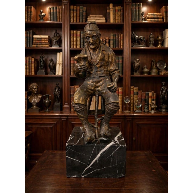 Bronze sculpture titled "The Drinker," by Italian artist Pasquale Fosca (1852–1928), created between the 19th and 20th...