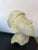 Handmade clay bust of a man with a cap. Signed by the artist.