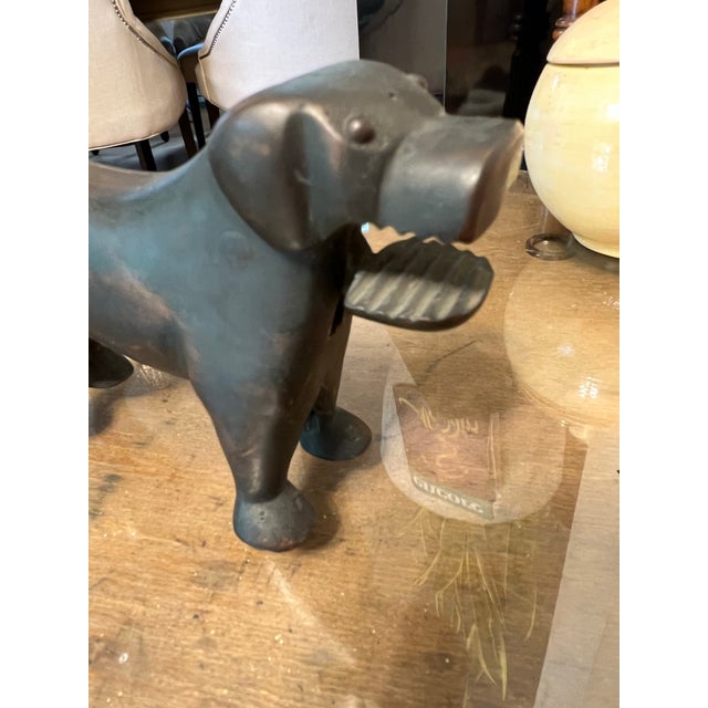 Up for consideration is a beautiful bronze dog nut cracker from Portugal. This would look lovely in your home and it is a...