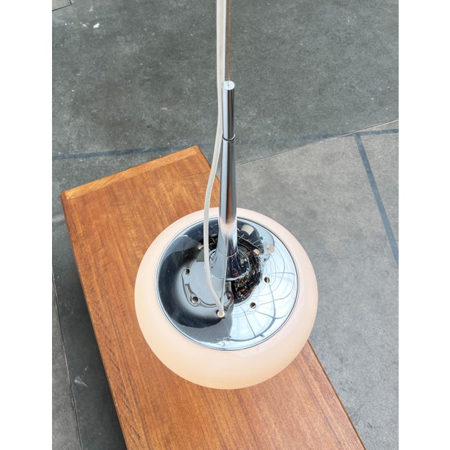 Rare mid-century pendant lamp from the Italian manufacturer Reggiani based on a design by Goffredo Reggiani from the...