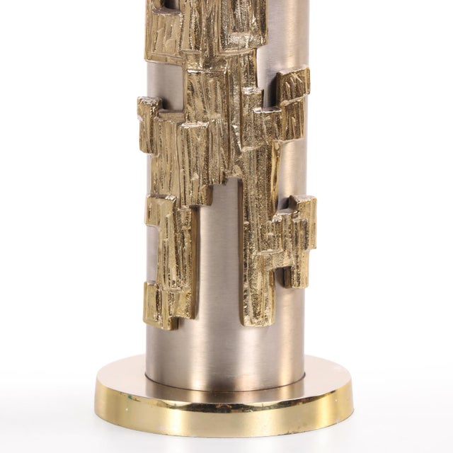 A sculptural metal table lamp by Laurel Lamp Company, executed in a bold Brutalist style. The design features textured...