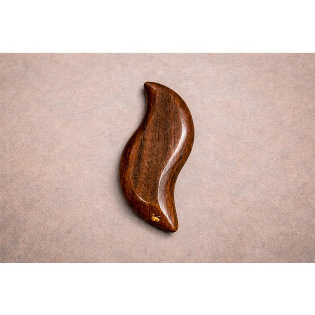 Handcrafted in Brazil from solid jacarandá (Brazilian rosewood), this platter reflects the mid-century emphasis on organic...